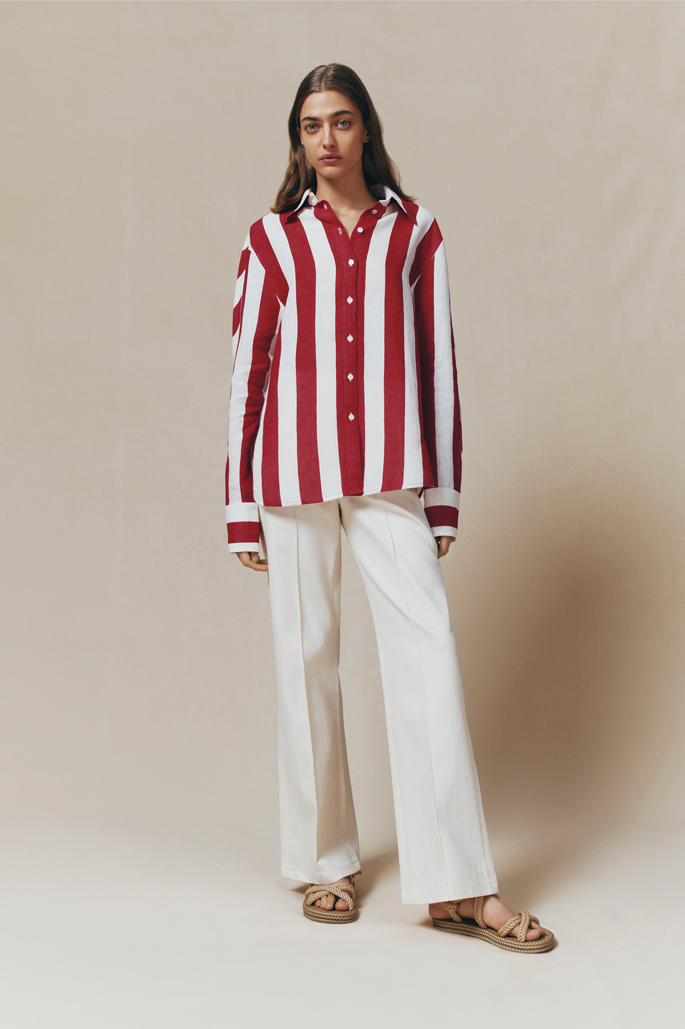 Denim ecru flared pants with circular pocket details