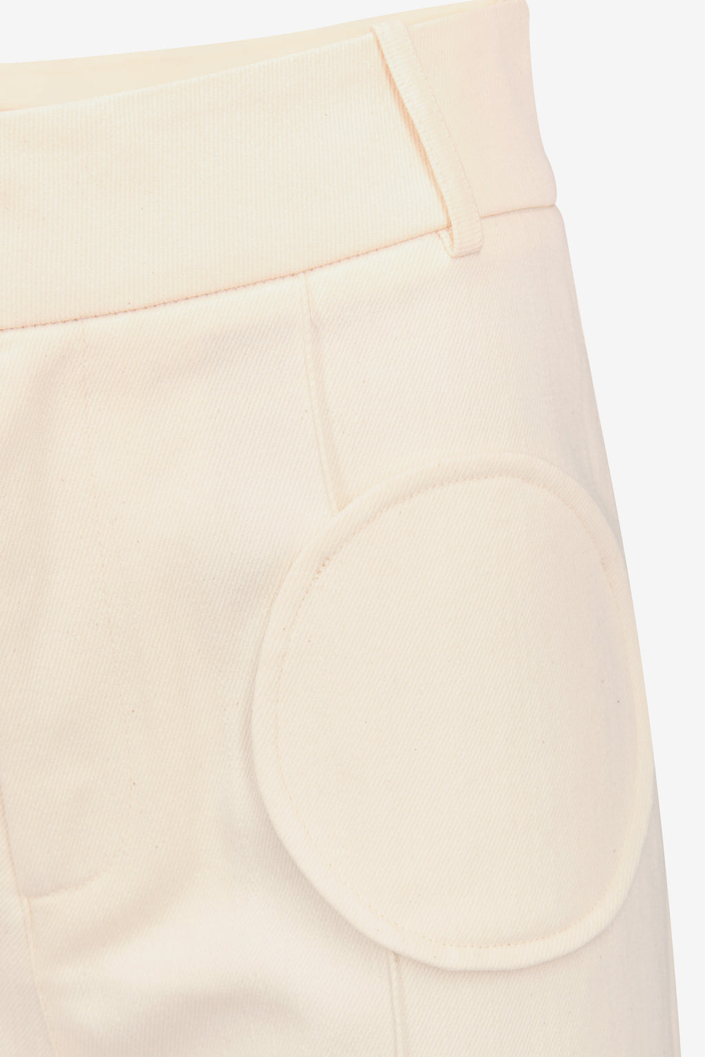 Denim ecru flared pants with circular pocket details